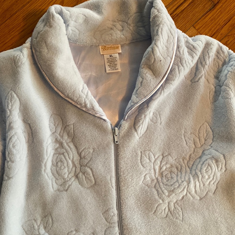 Baby blue fleece-like zip robe.   Perfect condition.  Soft.